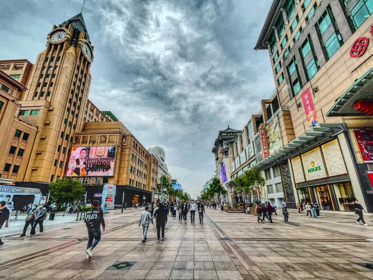Shops and pedestrians along Wangfujing pedestrian street